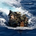 AAV approaches USS Peleliu well deck