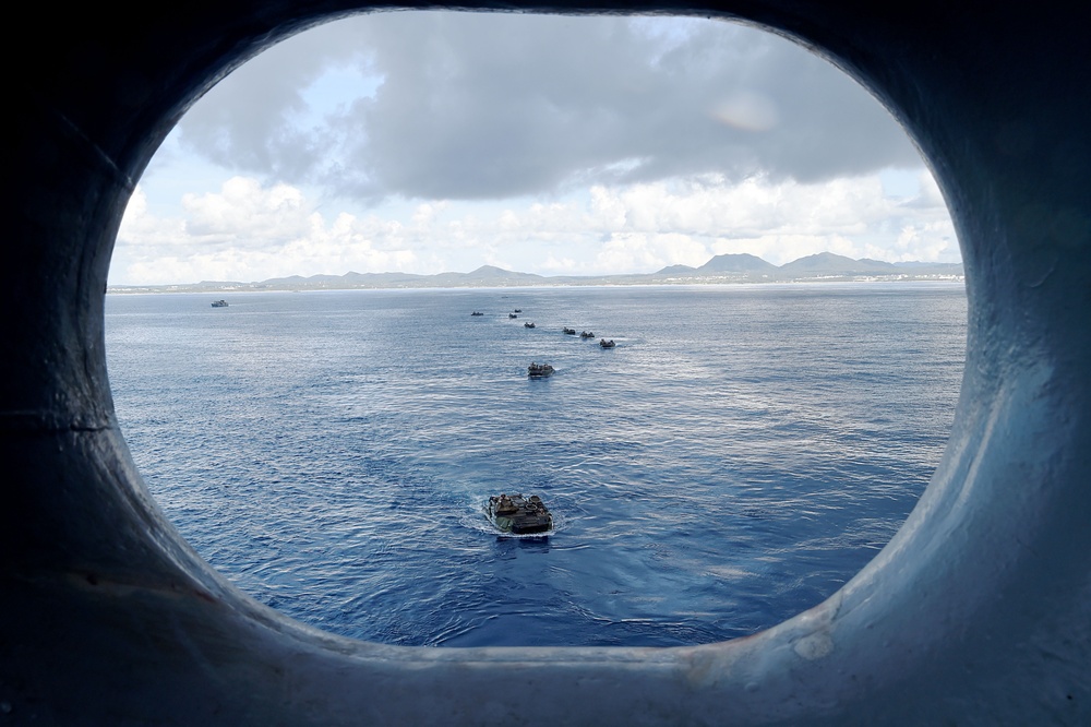 AAVs approach USS Peleliu well deck