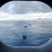 AAVs approach USS Peleliu well deck