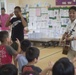 Marines teach English through song, dance