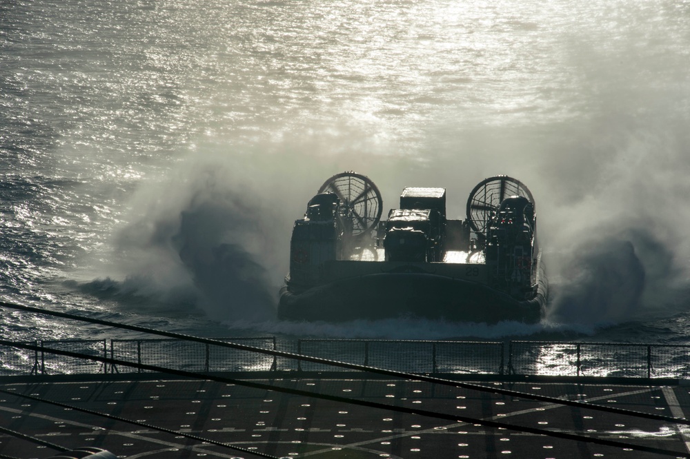 USS Germantown conducts equipment on-load with LCAC