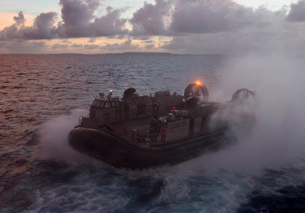 USS Germantown conducts equipment on-load with LCAC