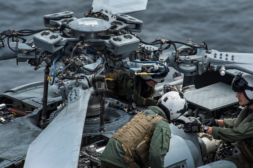 'Blackjacks' conduct Seahawk maintenance aboard USS America