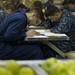 USS America sailors take first class petty officer advancement exam