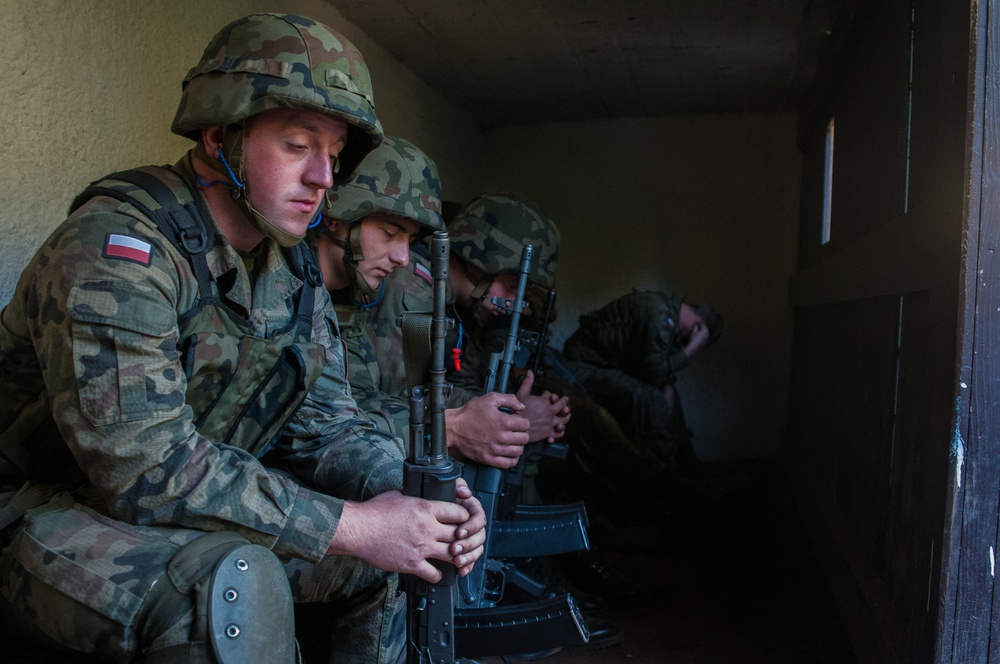 Waiting to throw their grenades