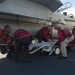 Sailors load marine locator