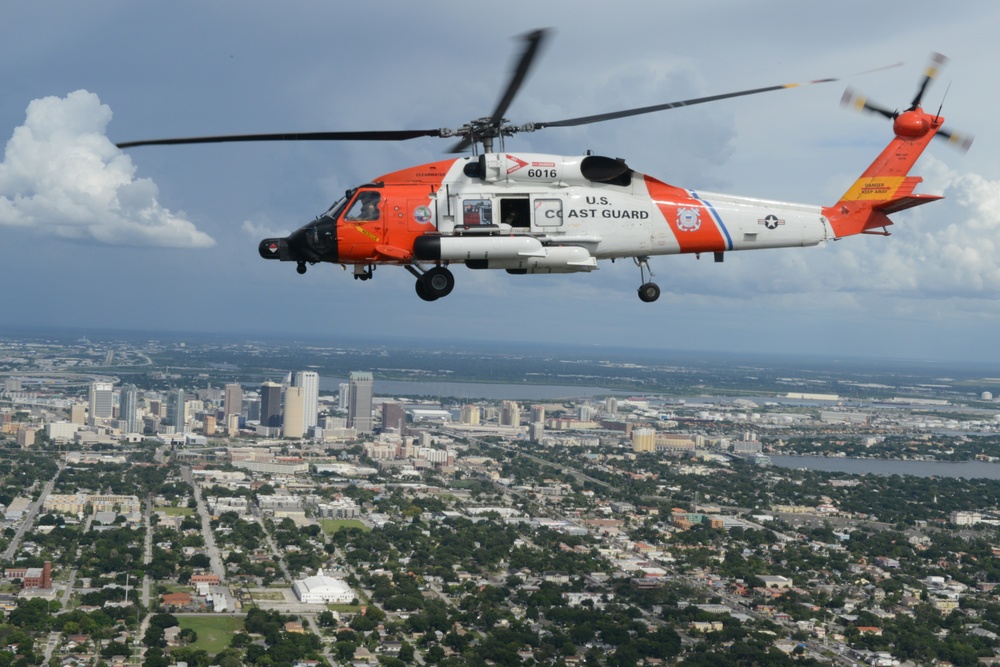 Coast Guard conducts flyover for football game