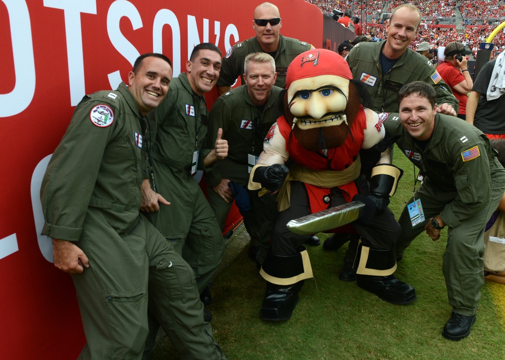 Coast Guard conducts flyover for football game