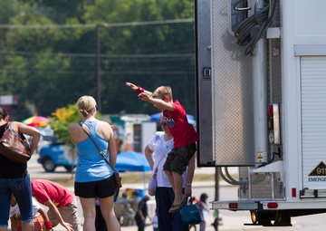 Soldiers welcome West Creek students back to school