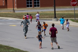 Soldiers welcome West Creek students back to school
