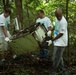 Service members volunteer for river cleanup