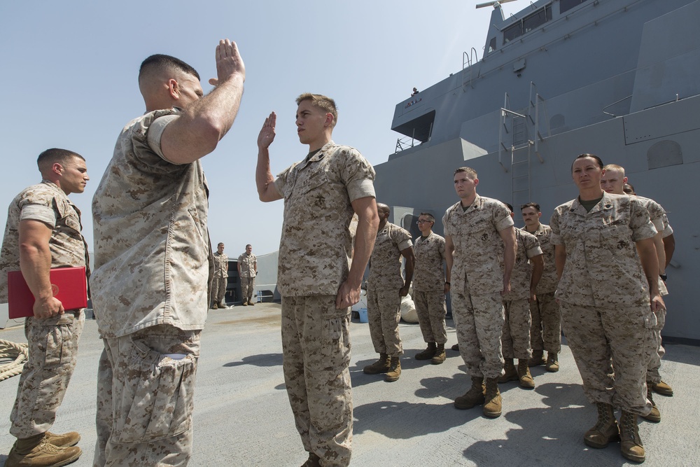 DVIDS - Images - CLB-22 Marine reenlists at sea