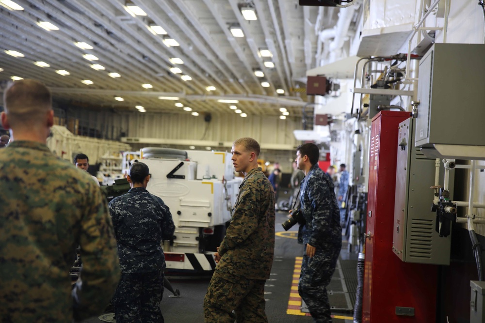 Distinguished visitors from El Salvador tour USS America