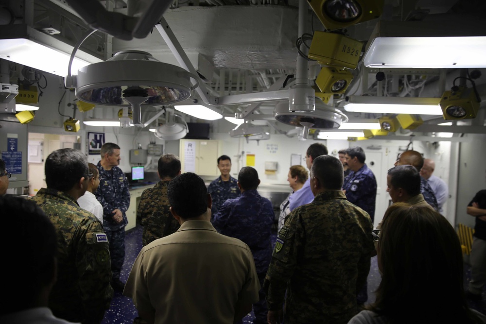 Distinguished visitors from El Salvador tour USS America