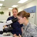Army Reserve combat medic reviews urine sample in lab