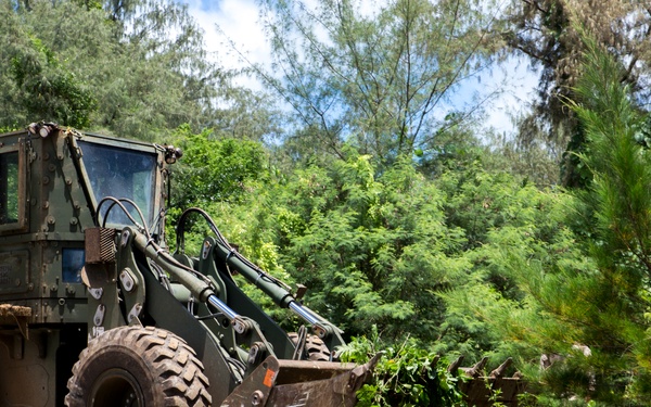 Heavy equipment operators get dirty to clear runway