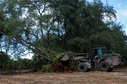 Heavy equipment operators get dirty to clear runway