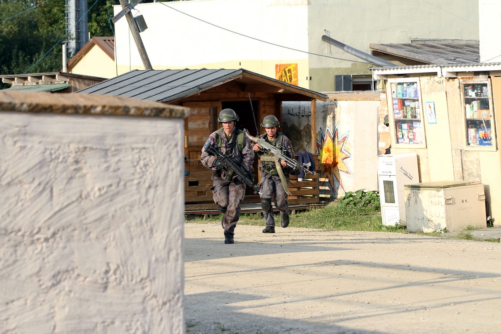 Lithuanian OPFOR attacks Camp West at Exercise Saber Junction 14