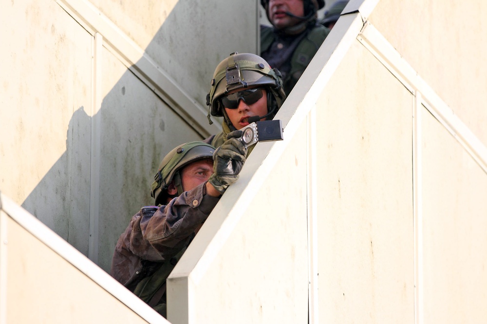 Lithuanian OPFOR attacks Camp West at Exercise Saber Junction 14
