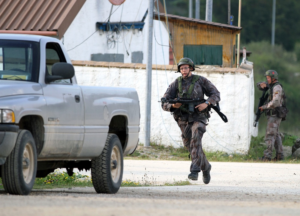 Lithuanian OPFOR attacks Camp West at Exercise Saber Junction 14