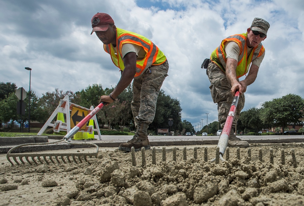 Civil engineer squadrons team up, repave road