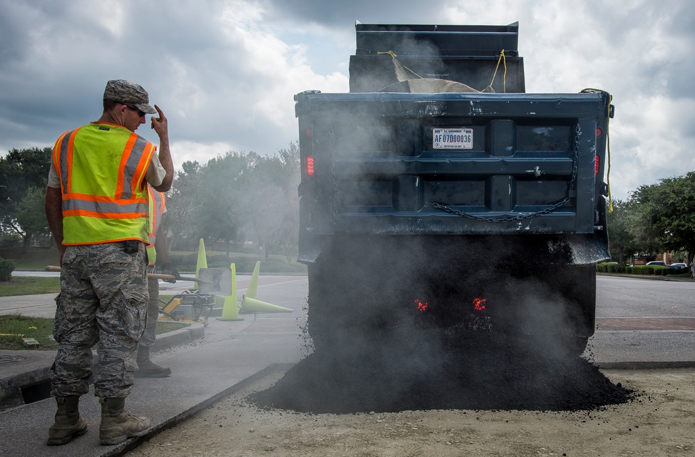 Civil engineer squadrons team up, repave road