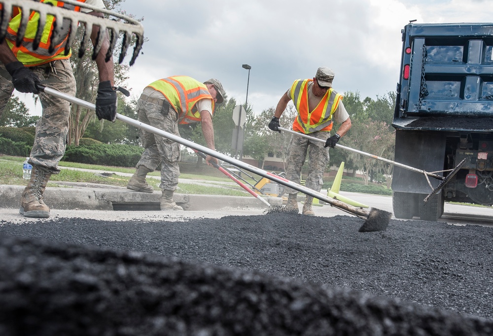 Civil engineer squadrons team up, repave road