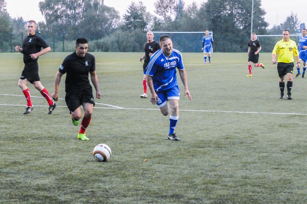 US paratroopers and Polish hosts remember 9/11 with a soccer match