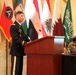 US Army captain speaks to multinational audience during Medical Security Symposium