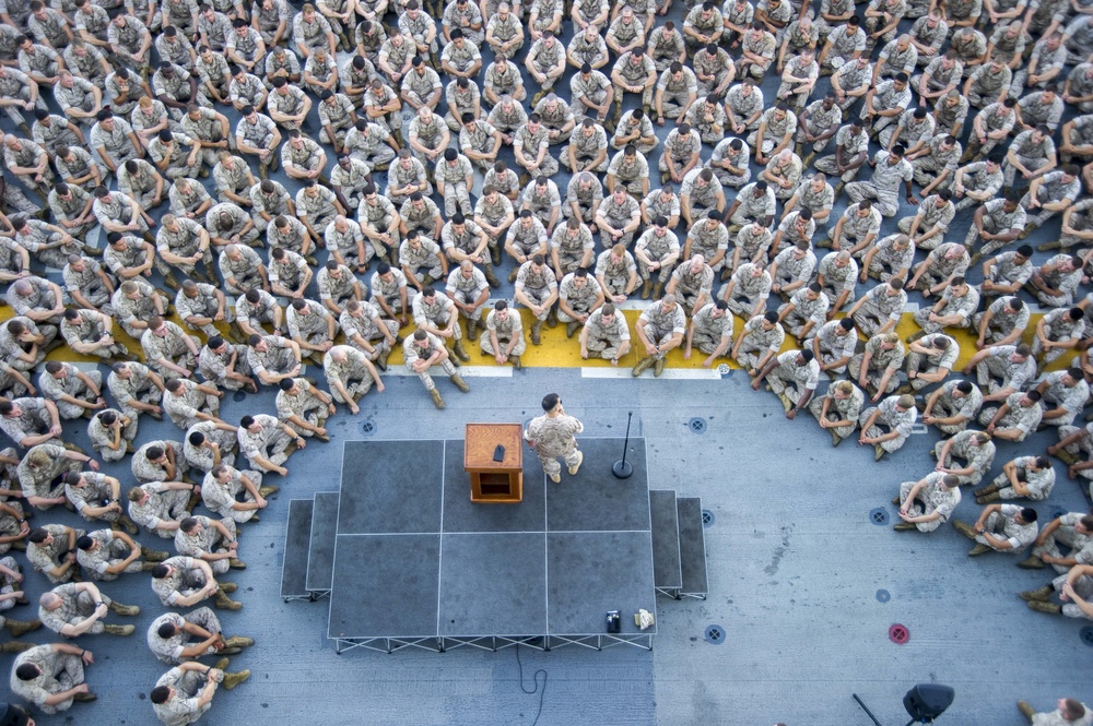 Marine all-hands call aboard Peleliu