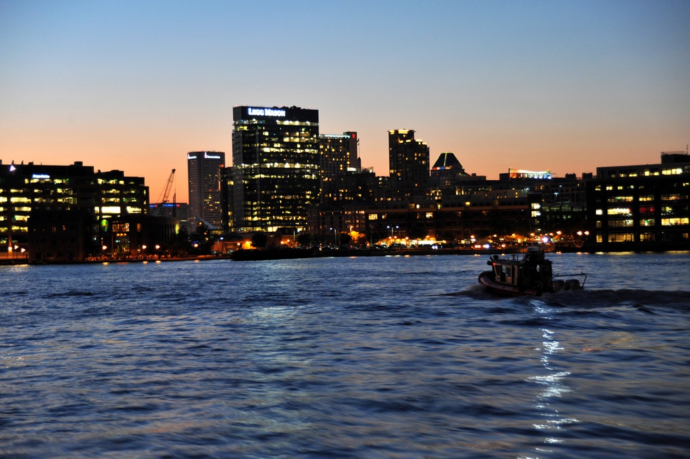 Crew members from Coast Guard Maritime Safety and Security Team Kings Bay, Ga., patrol Baltimore’s Inner Harbor