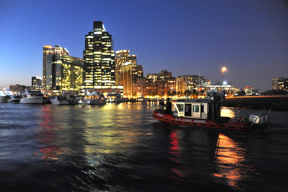 Crew members from Coast Guard Maritime Safety and Security Team Kings Bay, Ga., patrol Baltimore’s Inner Harbor