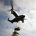 Osprey lifts a Harrier engine