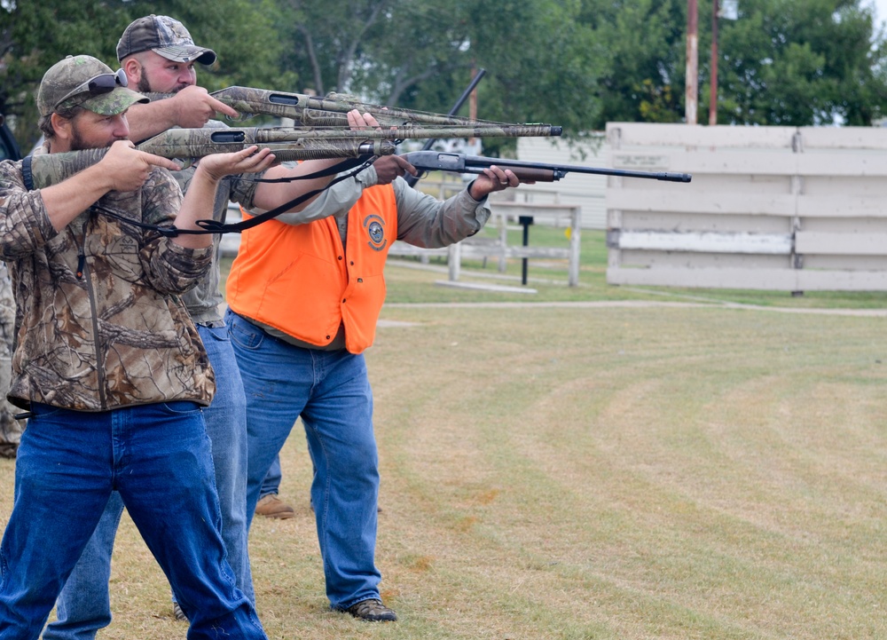 Competitors take aim in the Turkey Shoot event during the Fort Hood Hunting and Fishing Day