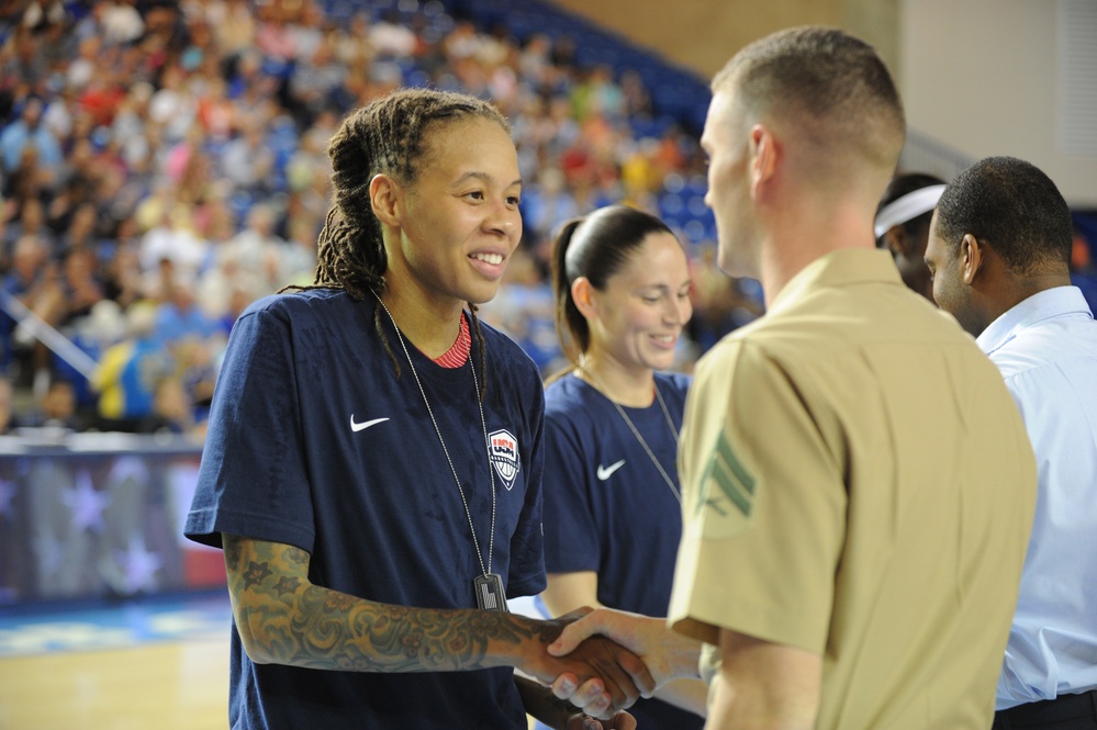 USA Women's Basketball Team receives dog tags from service members