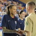USA Women's Basketball Team receives dog tags from service members