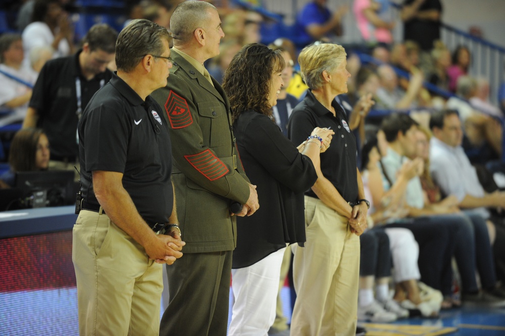 USA Women's Basketball Team receives dog tags from service members