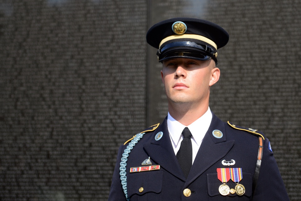 Family of MOH recipient Army Spc. 4 Donald P. Sloat makes solemn visit to Vietnam Wall