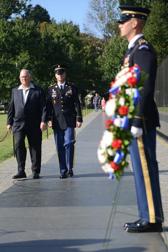 Family of MOH recipient Army Spc. 4 Donald P. Sloat makes solemn visit to Vietnam Wall
