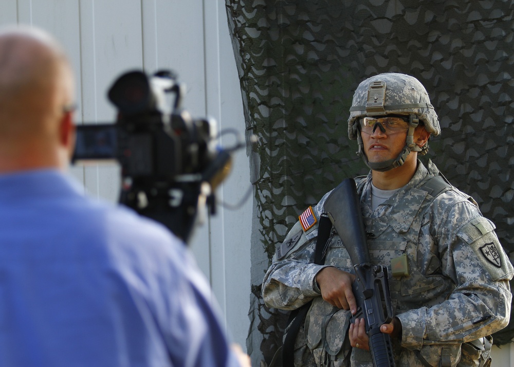 Sgt. Ricardo M. Ruiz does TV interview at 2014 USAREUR Best Warrior Competition