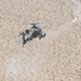 Apache attack helicopter fires Hellfire missile