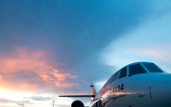 Crews prepare an HU-25 Falcon for flight