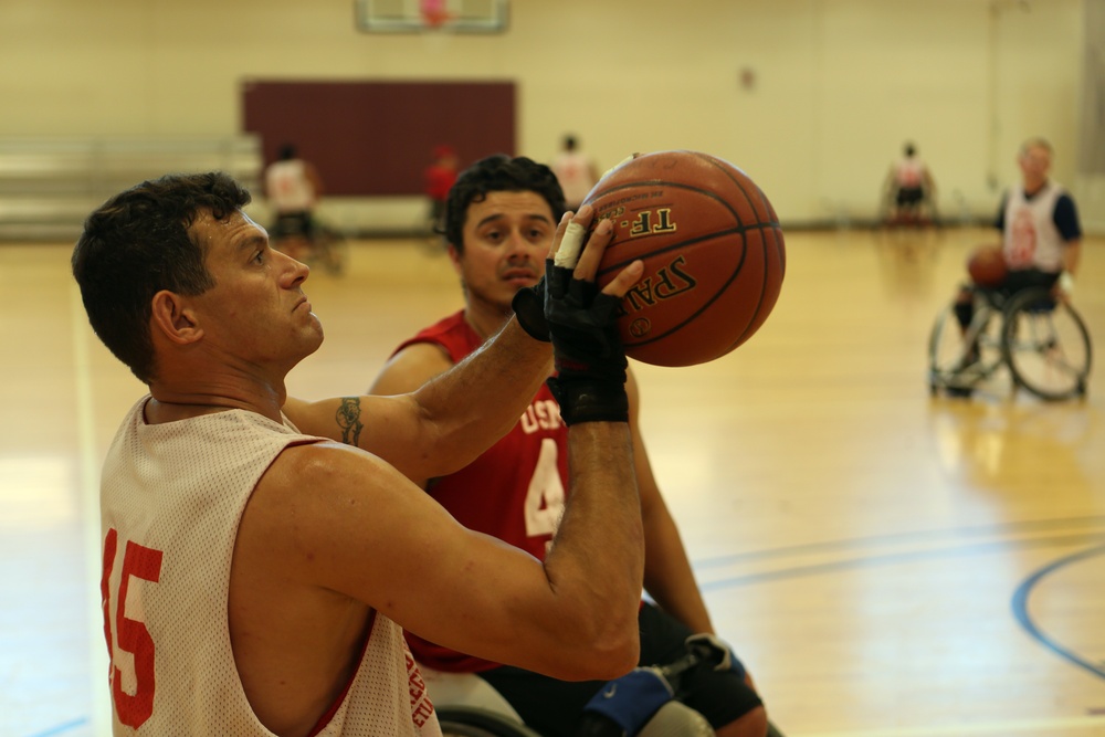 Marines practice wheelchair basketball in preparation for 2014 Warrior Games