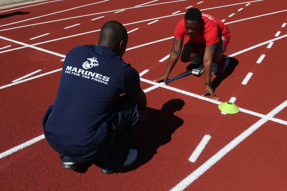 Marines practice track in preparation for 2014 Warrior Games