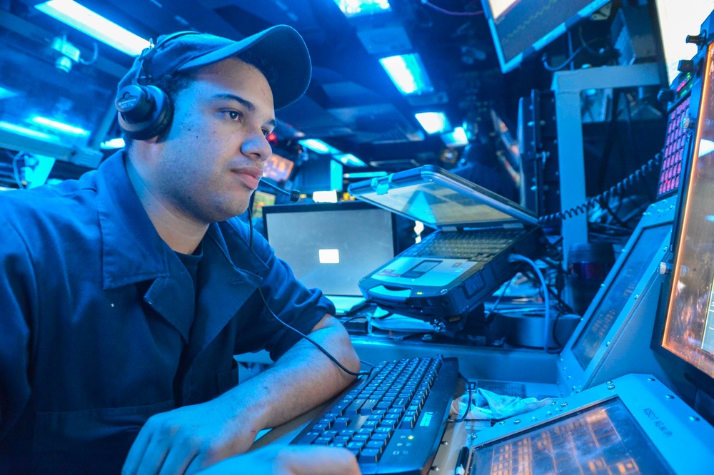 USS Antietam stands watch in the combat information center