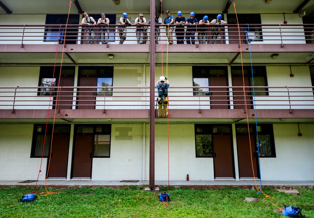 Air Force firefighters receive high angle rescue training