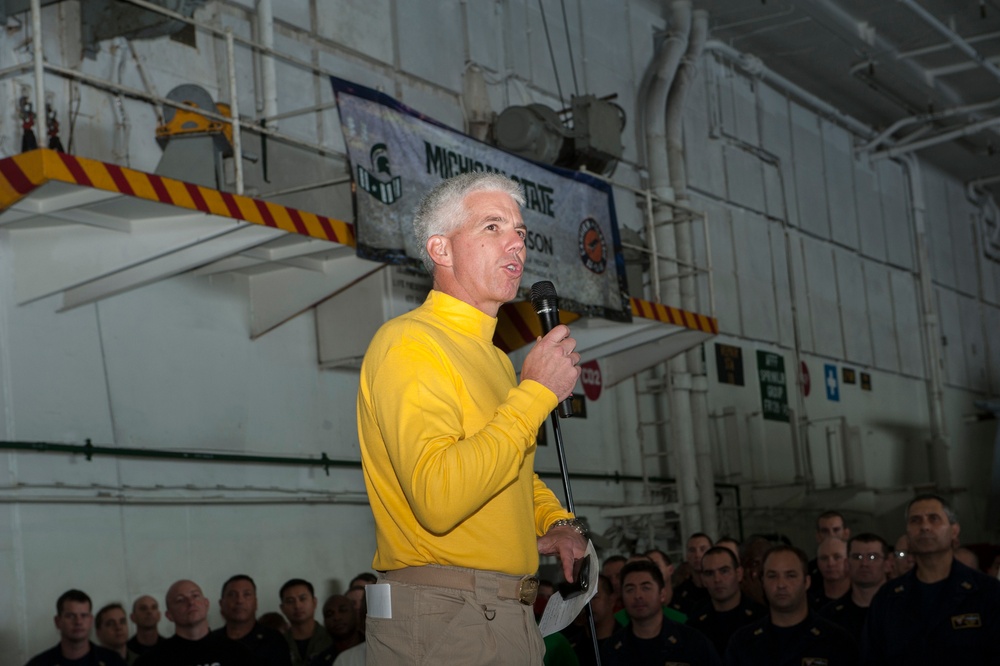 USS Carl Vinson commanding officer speaks to Sailors in the hangar bay