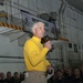 USS Carl Vinson commanding officer speaks to Sailors in the hangar bay