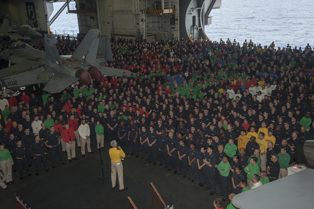 USS Carl Vinson commanding officer speaks to Sailors in the hangar bay