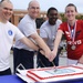 JBAB Airmen cut Air Force Birthday cake at 5K run